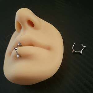 Silver spiked clip on snake bite lip rings